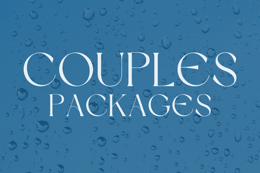 A blue background with water droplets and the text "COUPLES PACKAGES" in white. The image promotes couples' wellness packages at Ocean Beach, which include Oxygen, Hocatt, and PEMF therapies.